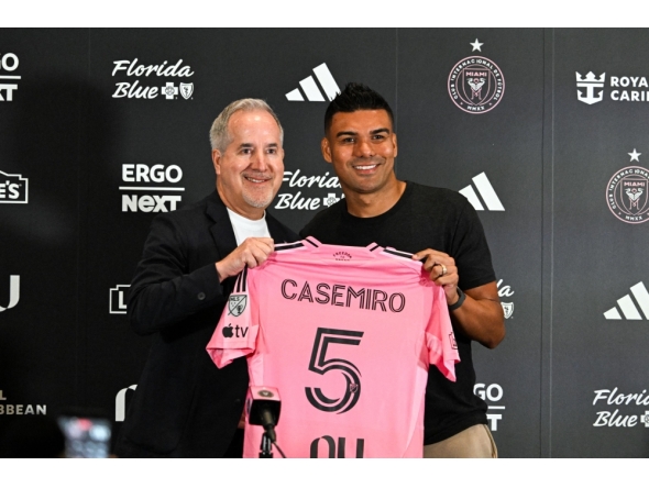 Brazilian midfielder Casemiro poses with Inter Miami managing owner and CEO Jorge Mas, on July 30, 2026. (Photo by Chandan Khanna / AFP)
