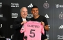 Brazilian midfielder Casemiro poses with Inter Miami managing owner and CEO Jorge Mas, on July 30, 2026. (Photo by Chandan Khanna / AFP)