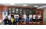 Officials with a group of students who participated in an awareness session.