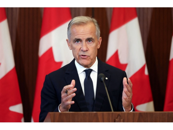 Canadian Prime Minister Mark Crney speaks at a press conference in Ottawa, Ontario, on August 22, 2026 after trade talks with the US collapsed. Photo by Dave Chan / AFP