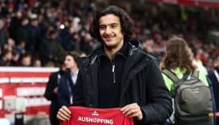 Lille's French midfielder #32 Ayyoub Bouaddi poses for a photograph with a jersey reading 