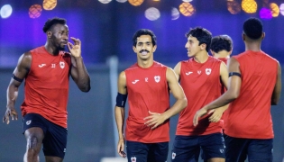 Al Rayyan players gear up for their match against Al Wakrah.