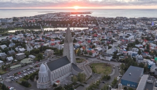 This aerial view taken on August 28, 2026, shows a panoramic view of Reykjavik, Iceland, with Hallgrimskirkja,  (Photo by Halldor KOLBEINS / AFP)