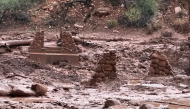 This handout image released by the Grand Canyon National Park Service via X (formerly Twitter) on August 30, 2026 shows remnants of stone bridge pylons along Bright Angel Creek following a flash flood that destroyed the footbridge on August 29. Photo by J.THOMPSON and Handout / NATIONAL PARK SERVICE / AFP