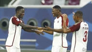 Al Arabi’s Issa Laye (left) celebrates with teammates after scoring against Al Sailiya.  