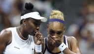 Venus Williams and Serena Williams of the United States in their Women's Doubles match against Hao-Ching Chan of Taiwan and Maya Joint of Australia on Day Six of the 2026 US Open at USTA Billie Jean King National Tennis Center on September 04, 2026 in the Flushing neighborhood of the Queens borough of New York City. Julian Finney/Getty Images/AFP (Photo by JULIAN FINNEY / GETTY IMAGES NORTH AMERICA / Getty Images via AFP)