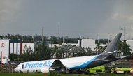 A Prime Air cargo plane is seen at Miami International Airport after it overran the runway at Miami International Airport in Miami, Florida, on September 6, 2026. Photo by CHANDAN KHANNA / AFP