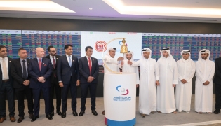 Senior officials of Baladna and Qatar Stock Exchange during the bell ringing ceremony at the QSE headquarters yesterday.
