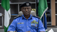 Nigeria's Inspector-General of Police Olatunji Disu poses for a portrait inside his office at the Nigeria Police Force Headquarters, Louis Edet House, in Abuja, on September 9, 2026.  (Photo by Light Oriye Tamunotonye / AFP)
