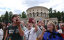 Fans of Canadian singer Céline Dion sing during a “Giant Karaoke” event in her honor in front of the La Rotonde Stalingrad monument in Paris on September 11, 2026, ahead of her concert on September 12. (Photo by Anne-Christine Poujoulat / AFP)