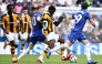 Chelsea's English midfielder Cole Palmer (2L) tackles Hull City's French striker #50 Mohamed-Ali Cho during the English Premier League football match between Chelsea and Hull City at Stamford Bridge in London on September 12, 2026. (Photo by Henry NICHOLLS / AFP) 