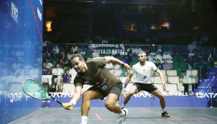 Egypt's Karim Abdel Gawad (left) in action against Qatar's Abdulla Al Tamimi.
