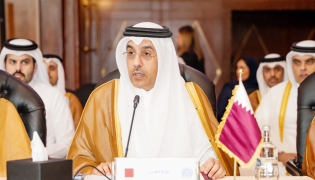 Minister of Labour H E Dr Ali bin Smaikh Al Marri speaking at the event.