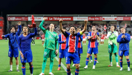 (From L) Paris Saint-Germain's French midfielder #14 Desire Doue, Russian goalkeeper #39 Matvey Safonov, Brazilian defender #05 Marquinhos and defender #03 Lucas Digne celebrate their victory at the end of the French L1 football match between Stade Brestois 29 and Paris Saint-Germain (PSG) at the Stade Francis-Le Ble in Brest on September 13, 2026. (Photo by FRED TANNEAU / AFP)