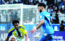 Action during the match between Al Gharafa and Al Hilal.