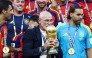 Spain's head coach Luis de la Fuente kisses the trophy after winning the 2026 World Cup football tournament final match between Spain and Argentina at the New York/New Jersey Stadium in East Rutherford on July 19, 2026. (Photo by Franck Fife / AFP)

