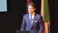 Italian Ambassador to Qatar H E Paolo Toschi delivering his address at the event.