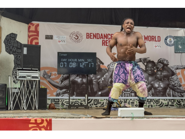 Nigerian dancer Benjamin Daniel Gabriel, 32, dances on stage to set a new world record for the longest individual dance marathon in Lagos on September 29, 2026. (Photo by Tonye Bakare / AFP)