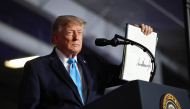US President Donald Trump signs an executive order to lower the cost of diesel fuel on October 05, 2026 in Grand Island, Nebraska. Win McNamee/Getty Images/AFP