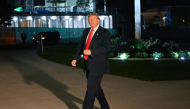 US President Donald Trump speaks with the media after arriving on Marine One on the South Lawn of the White House in Washington, DC on October 9, 2026. (Photo by Alex Wroblewski / AFP)
 