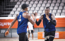 Qatar’s Cherif Younousse and Ahmed Tijan celebrate a point.