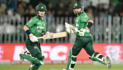 Pakistan’s captain Sahibzada Farhan (right) and Maaz Sadaqat run between the wickets during the second T20I.