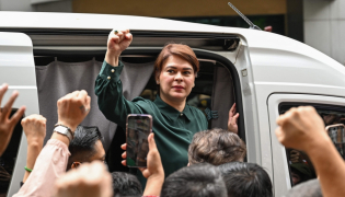 (Files) Philippine Vice President Sara Duterte gestures as she leaves the Hall of Justice in Quezon City, Metro Manila on September 11, 2026. (Photo by Jam Sta Rosa / AFP)