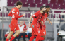 Al Duhail's Sekou Oumar Yansane (right) celebrates with teammates.