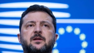 Ukraine's President Volodymyr Zelensky speaks during a press conference as part of a European Union summit at the EU headquarters in Brussels on October 16, 2026. (Photo by Nicolas Maeterlinck / Belga / AFP)