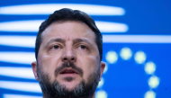 Ukraine's President Volodymyr Zelensky speaks during a press conference as part of a European Union summit at the EU headquarters in Brussels on October 16, 2026. (Photo by Nicolas Maeterlinck / Belga / AFP)