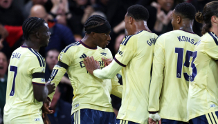 Arsenal's English midfielder #20 Noni Madueke (2L) celebrates scoring the team's first goal with teammates during the English Premier League football match between Nottingham Forest and Arsenal at The City Ground in Nottingham, central England, on October 18, 2026. (Photo by Darren Staples / AFP) 