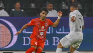 Al Duhail's Tahseen Mohammed Jamshid (left) and Al Sadd's Sekou Oumar Yansane in action.