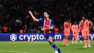 PSG's Portuguese midfielder #17 Vitinha celebrates after scoring his team third goal during the UEFA Champions League first round day 3 football match between Paris Saint-Germain (PSG) and FC Barcelona at the Parc de Princes stadium in Paris on October 20, 2026. (Photo by FRANCK FIFE / AFP)
