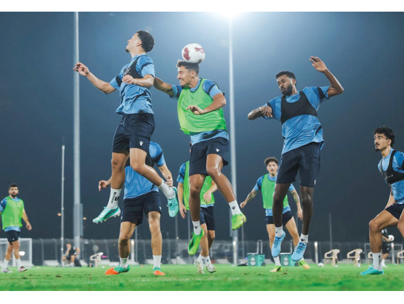 Al Ahli players take part in a training session.