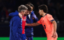 Barcelona's Spanish defender #12 Xavi Espart (R) comforts PSG's Georgian forward #07 Khvicha Kvaratskhelia leaving the pitch after sustaining an injury during the UEFA Champions League first round day 3 football match between Paris Saint Germain (PSG) and FC Barcelona at the Parc de Princes stadium in Paris on October 20, 2026. (Photo by FRANCK FIFE / AFP)