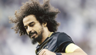 Al Sadd's Akram Afif celebrates after scoring a goal.