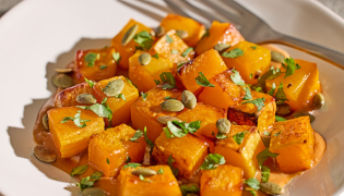 Honey-Roasted Squash With Spicy Peanut Sauce. (Tom McCorkle/For The Washington Post; food styling by Gina Nistico)
