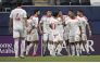 Al Shamal players celebrate a goal against Al Hilal.