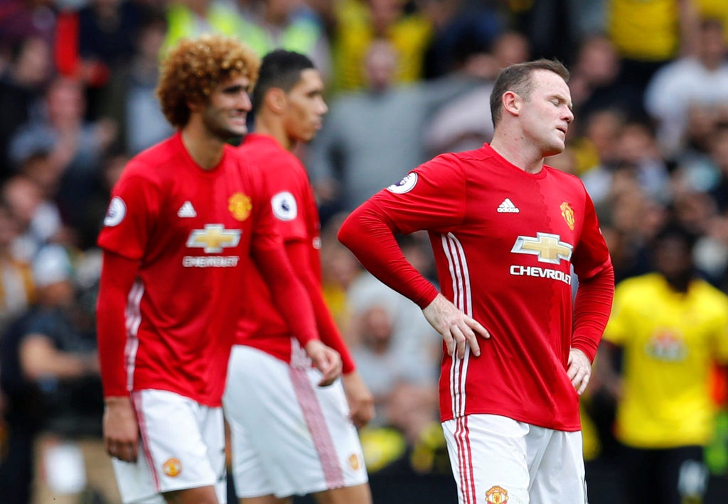 Manchester United's Wayne Rooney looks dejected after Watford's Troy Deeney scores their third goal. (Reuters / Eddie Keogh)
