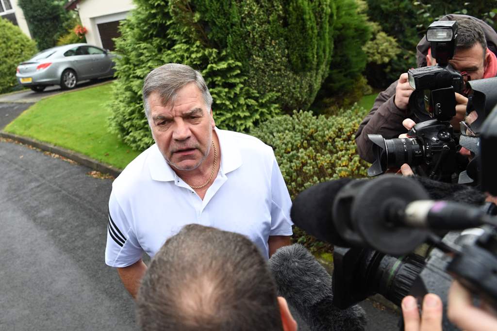 Former England national football team manager Sam Allardyce speaks to the press outside his home in Bolton on September 28, 2016. AFP / PAUL ELLIS