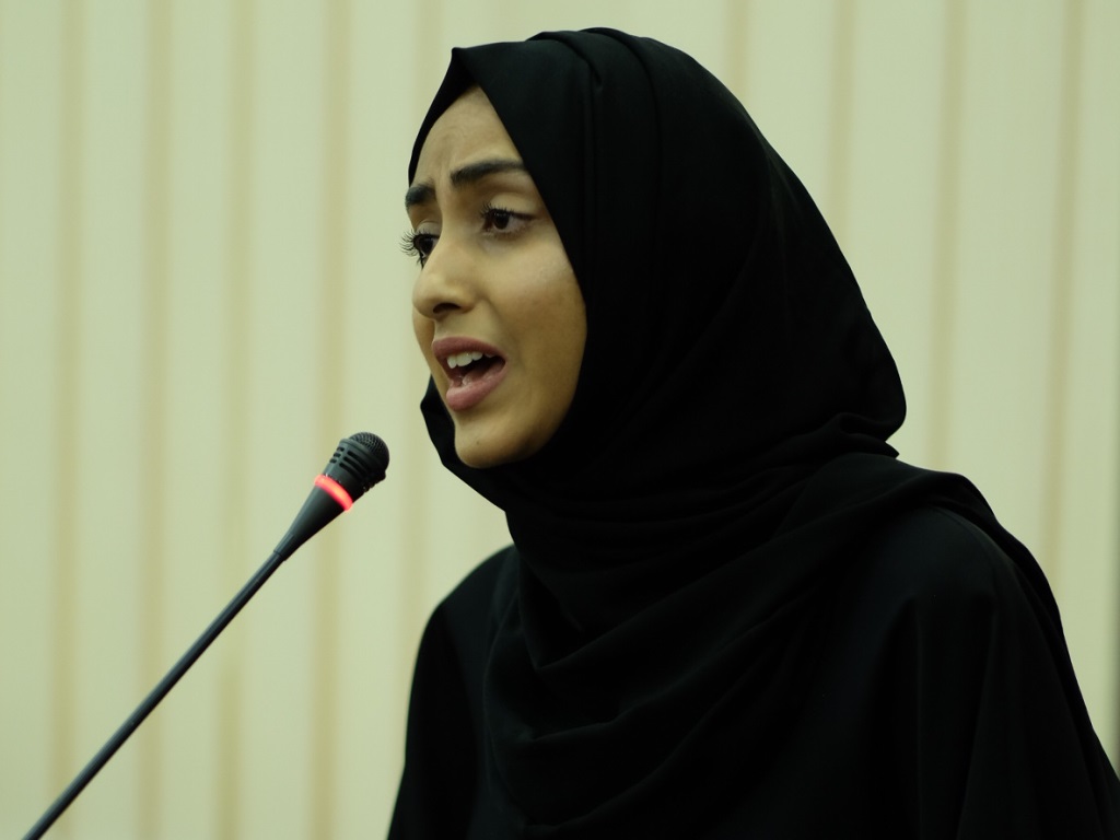 Nusayba Modak, student at QU Department of English Literature and Linguistics speaks at the event. 