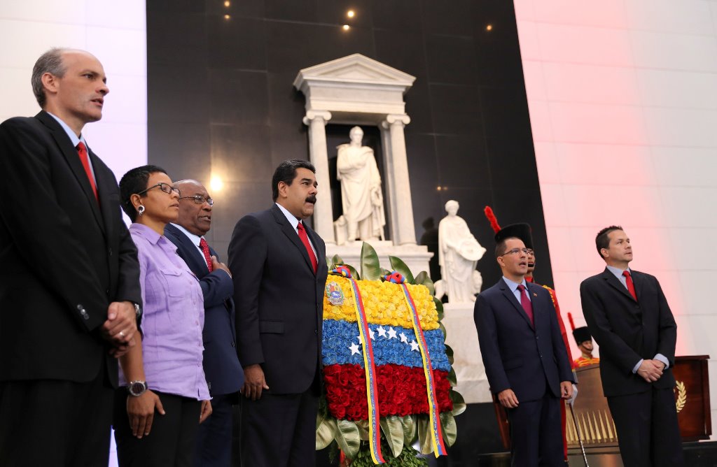 Venezuela's President Nicolas Maduro (C) attends a ceremony to sign off the 2017 national budget at the National Pantheon in Caracas, Venezuela October 14, 2016. Miraflores Palace/Handout via Reuters