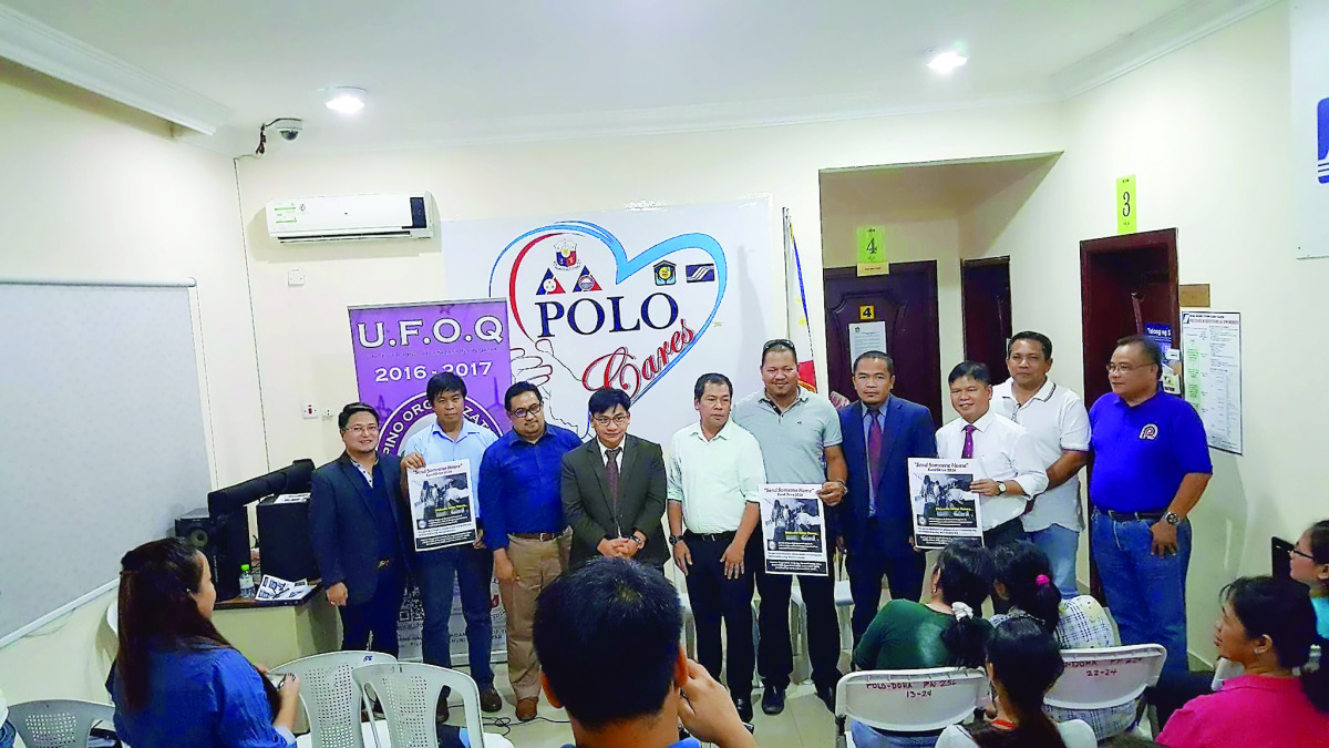 Labour Attache David Des Dicang (fourth left), UFOQ Chairman Ressie Fos (fourth right) and other officials at the launch of “Send Someone Home” project at POLO-OWWA headquarters on Tuesday.