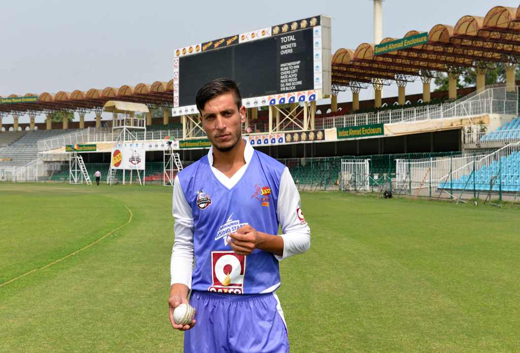 Pakistan under-19, fast bowler Yasir Jan, who plays for Lahore Qalandars T20 cricket team, gives an interview to AFP in Lahore. AFP / ARIF ALI
