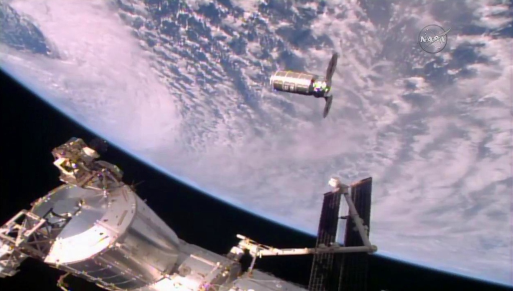 In this October 23, 2016 Iamge from NASA TV, the Cygnus resupply ship slowly approaches the International Space Station(ISS) before the Canadarm2 reaches out and grapples it.  AFP / NASA TV 