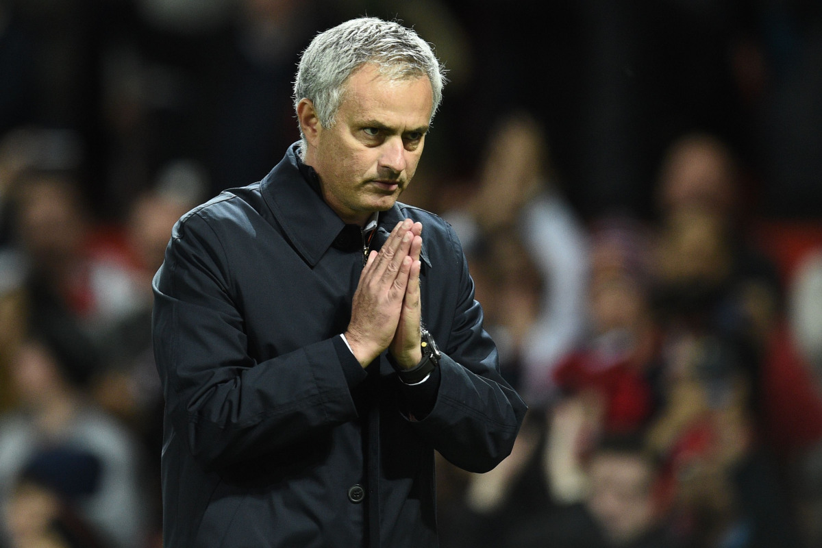 Manchester United's Portuguese manager Jose Mourinho gestures to supporters after the EFL (English Football League) Cup fourth round match between Manchester United and Manchester City at Old Trafford in Manchester, north west England on October 26, 2016.