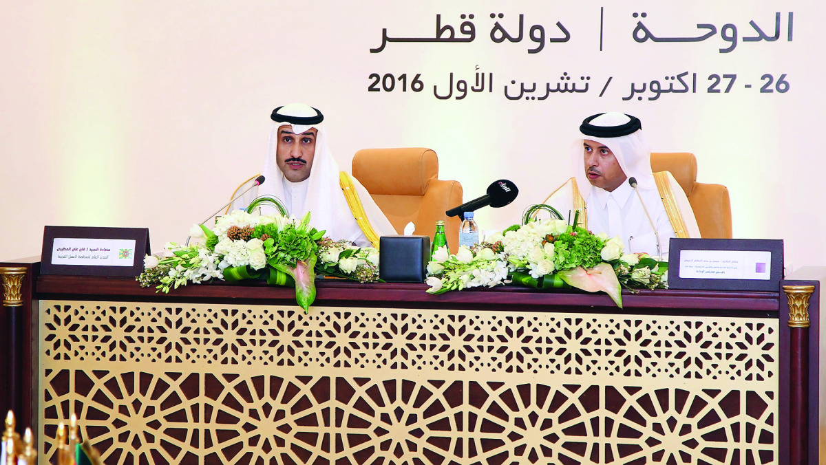 Minister of Administrative Development, Labour and Social Affairs H E Dr Issa bin Saad Al Jafali Al Nuaimi (right) at the 85th session of the Arab Labour Organisation (ALO), which started in Doha, yesterday.
