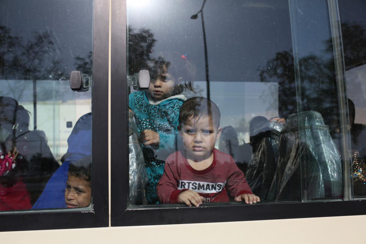 Iraqi people who were taking shelter at temporary camps are seen near the Mahmour district on their way to their homes after over 60 villages have been retaken from the terrorist group Daesh in Mosul, Iraq on October 30, 2016. ( Yunus Kele? - Anadolu Agen