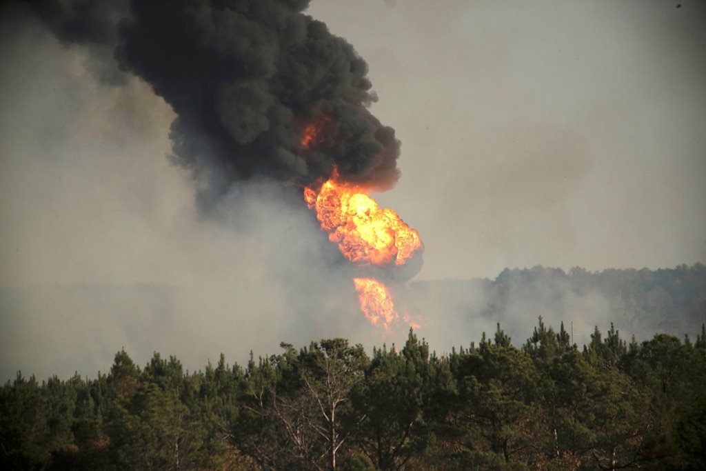 Flames shoot into the sky from a gas line explosion in western Shelby County, Alabama, U.S., October 31, 2016. Reuters/Marvin Gentry