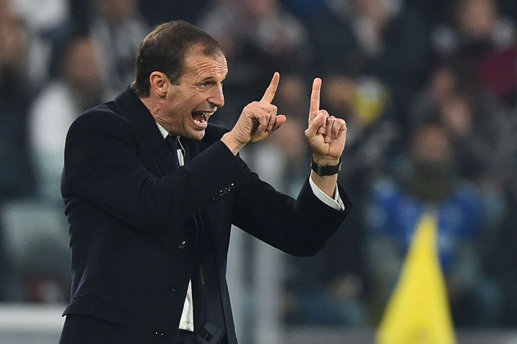 Juventus' coach from Italy Massimiliano Allegri reacts during the UEFA Champions League football match Juventus vs Olympique Lyonnais on November 2, 2016 at the Juventus stadium in Turin. / AFP / GIUSEPPE CACACE
